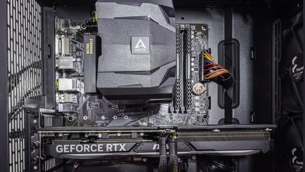 Close-up of a realistic gaming PC interior with RTX 4060 graphics card and RGB cooling system.