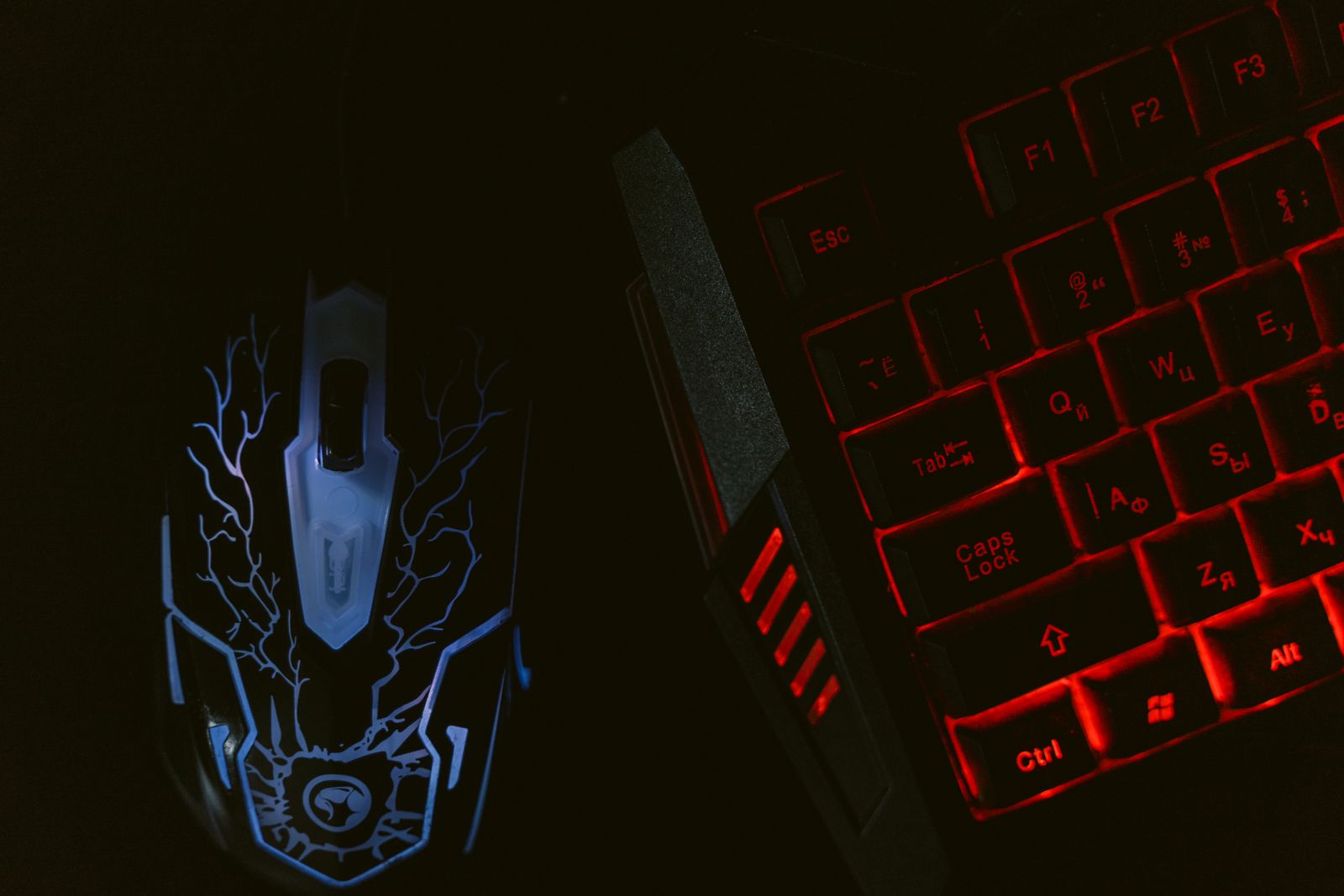 Glowing gaming mouse and backlit keyboard
