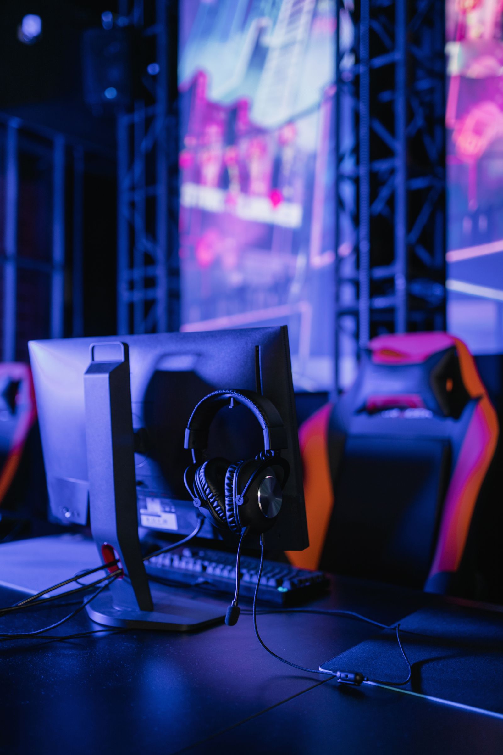 Modern gaming setup with monitor and headset