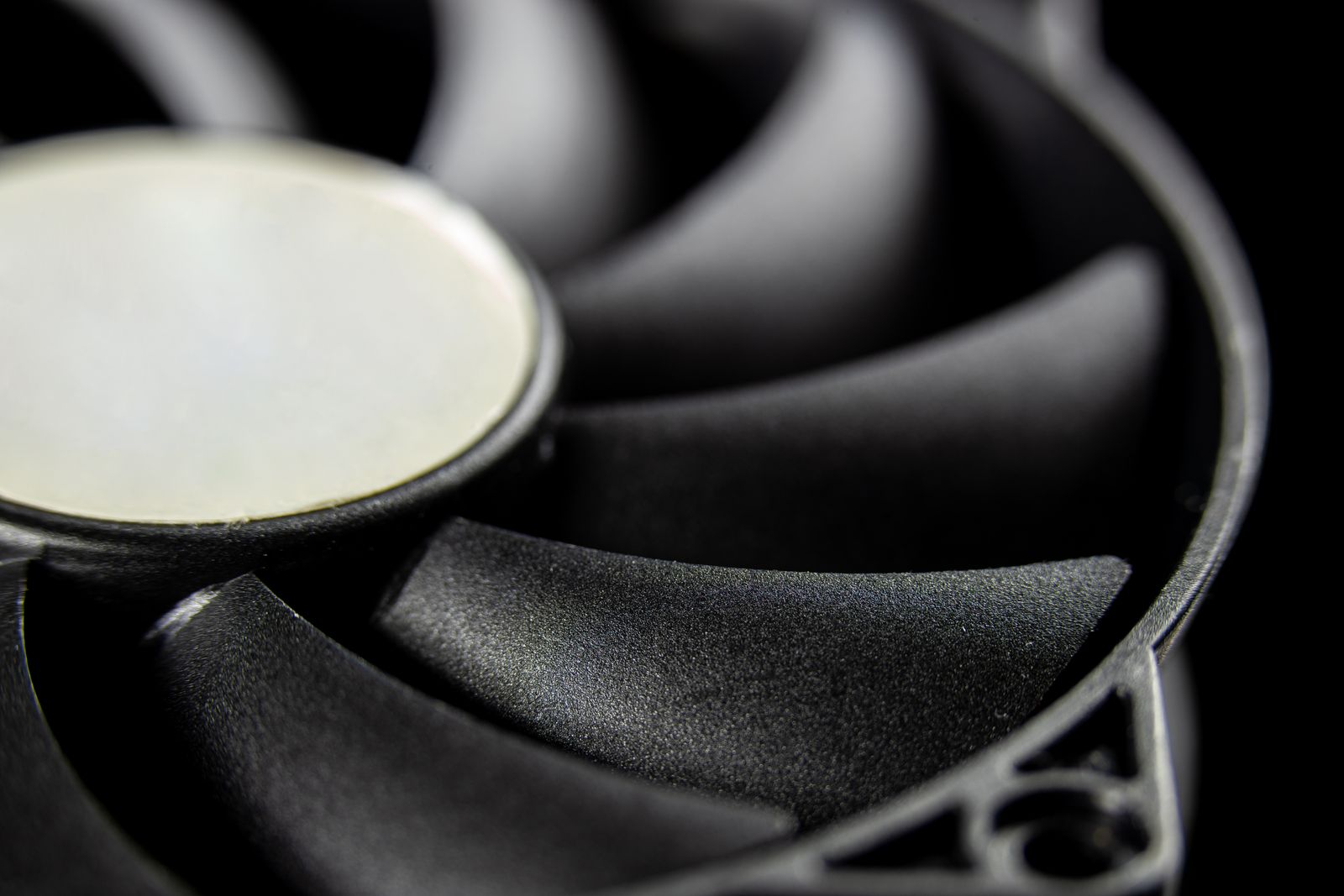 Macro close-up of a computer cooling fan blade