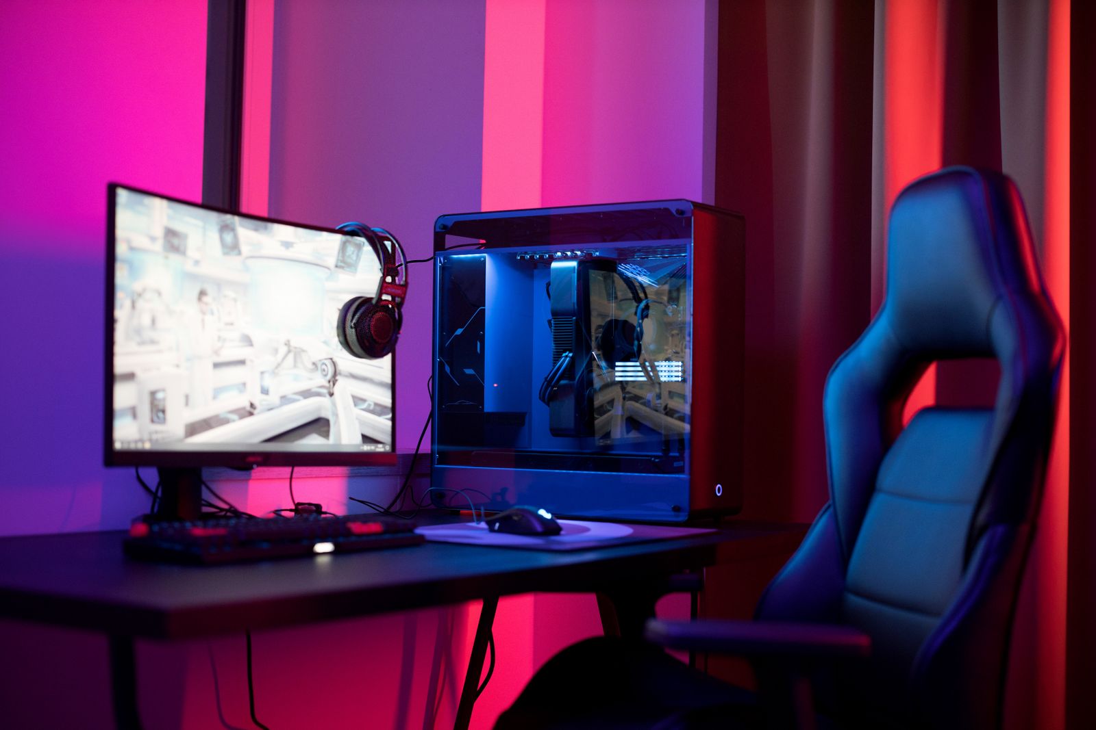 Gaming setup with widescreen monitor and ergonomic chair