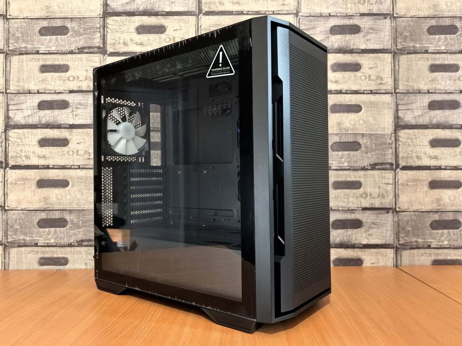 Black PC case with tempered glass side panel and front mesh airflow
