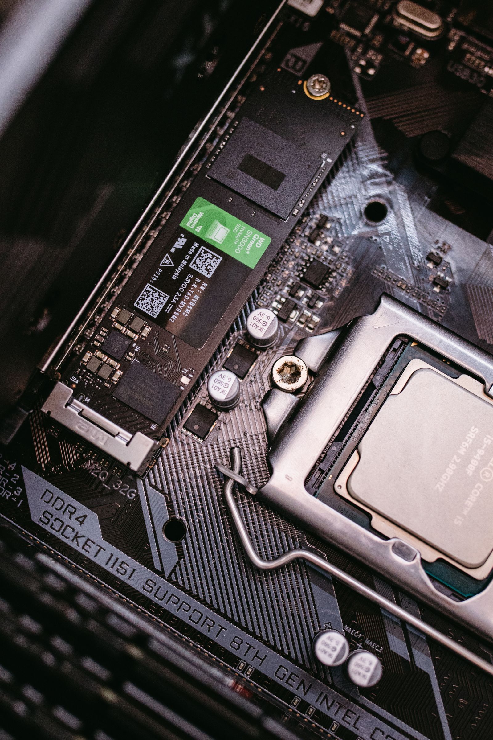 NVMe SSD installed on a motherboard next to the CPU socket